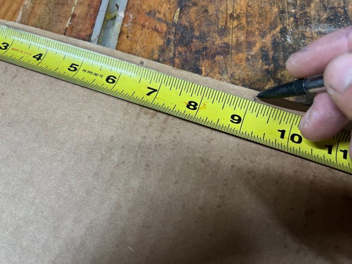 Mark a center point on your template piece.