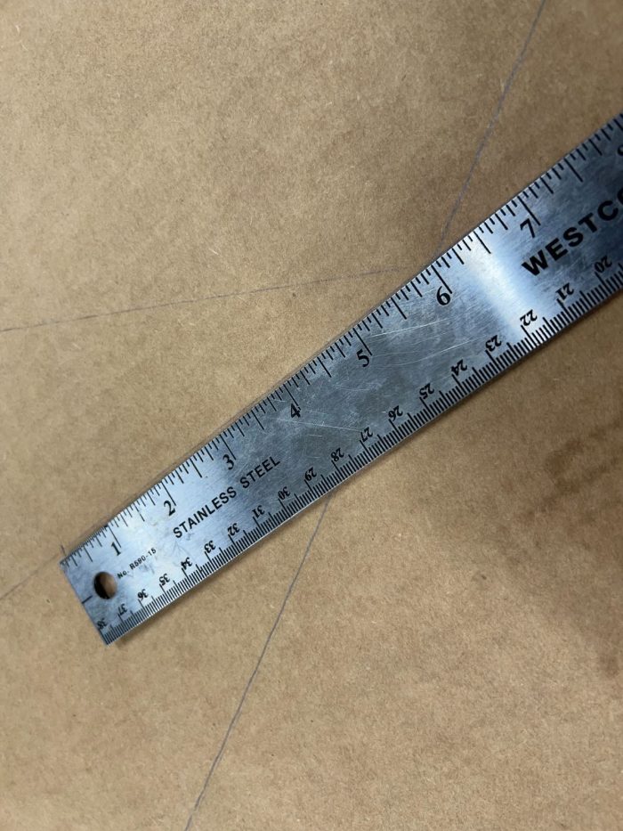 Mark out equidistant points from the center of your template.